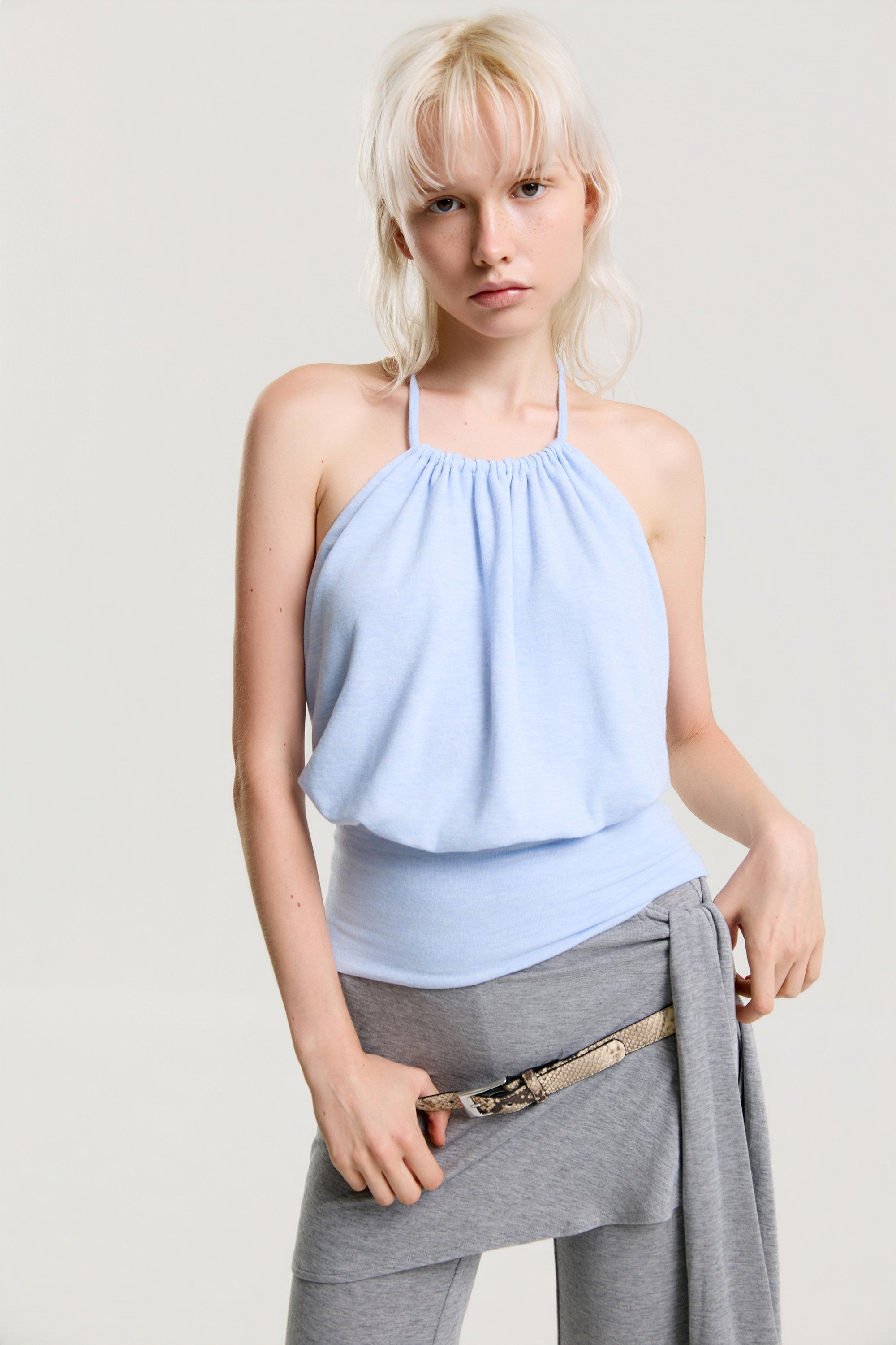 A Halter Top With a Bare Back and That Soft, Slightly Difficult Blue
