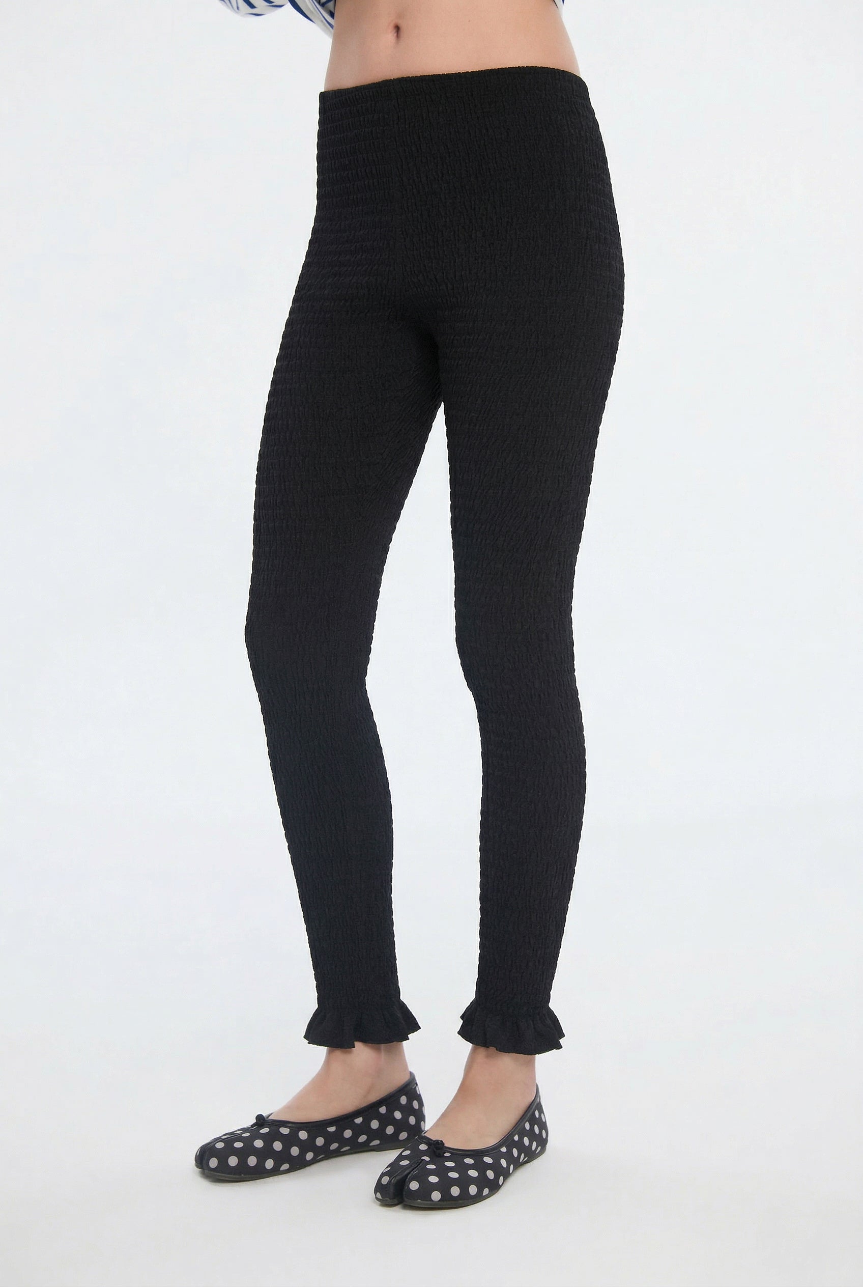 OTHER STORE Ripple Smocked Ruffle-Hem Cropped Leggings in Black