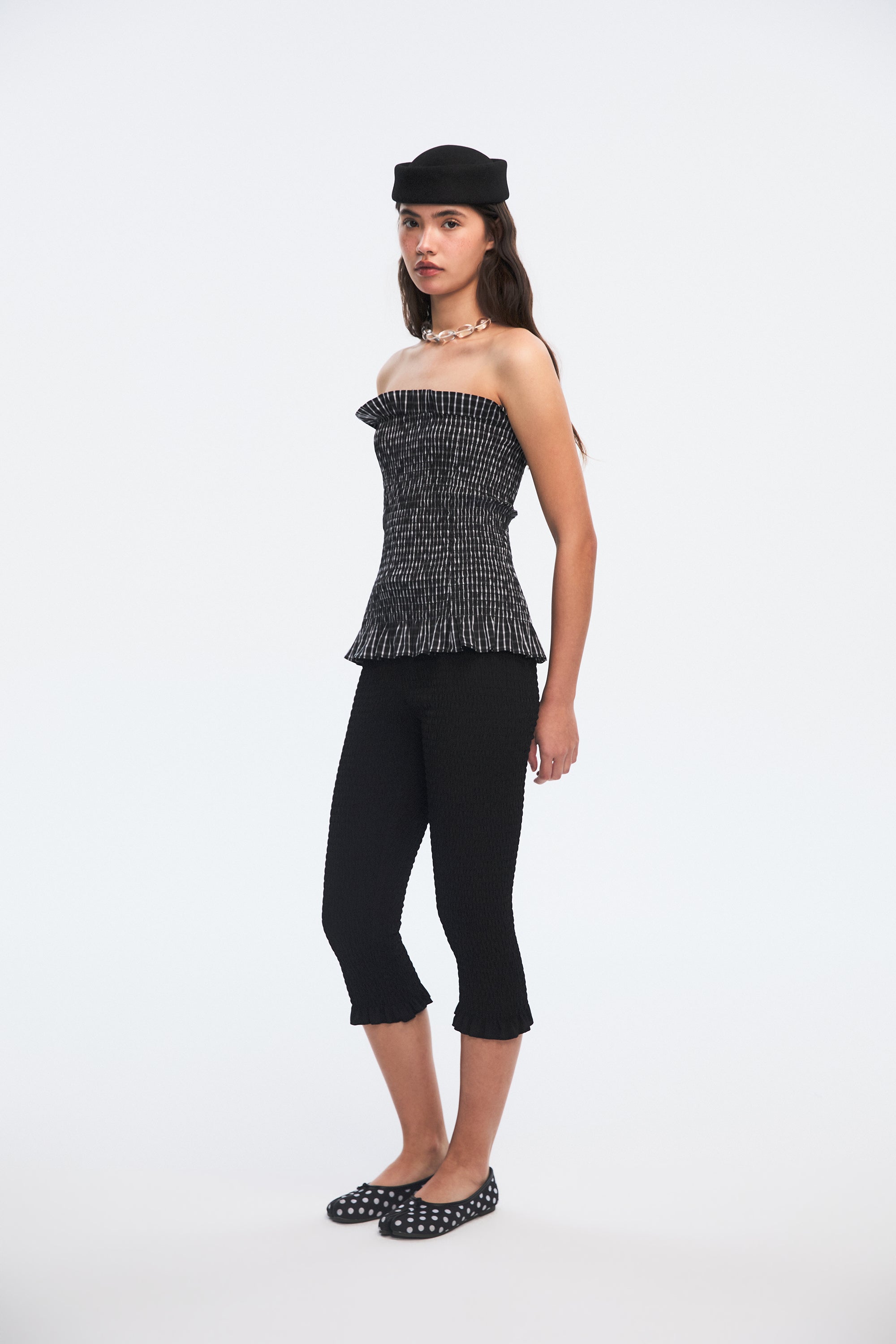 OTHER STORE Ripple Smocked Ruffle-Hem Capri Leggings in Black